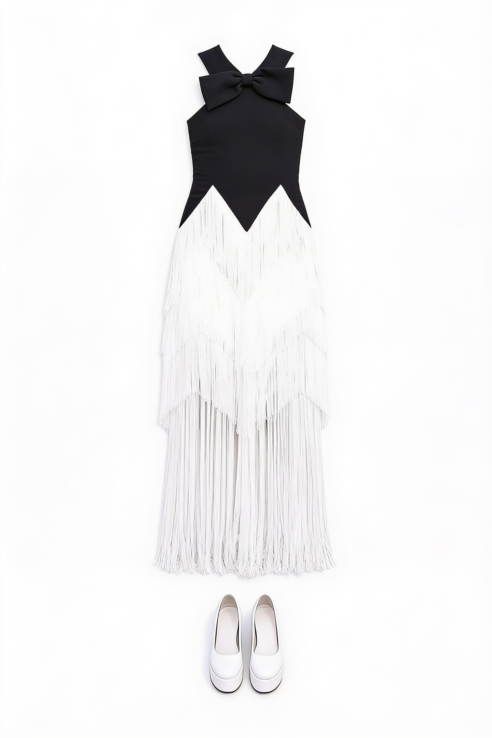 Black bow top and white fringed maxi skirt