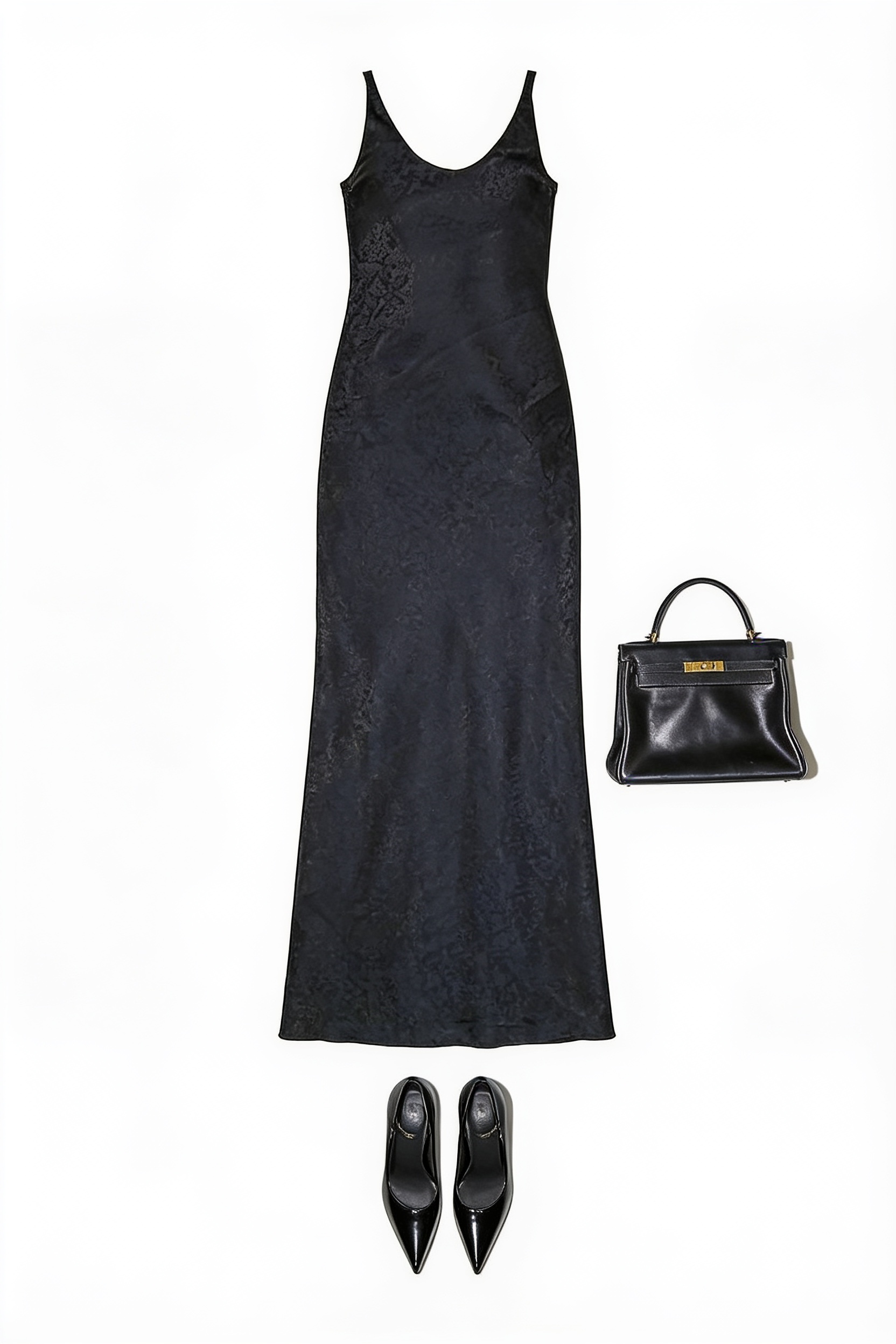 Black sleeveless maxi dress and structured handbag