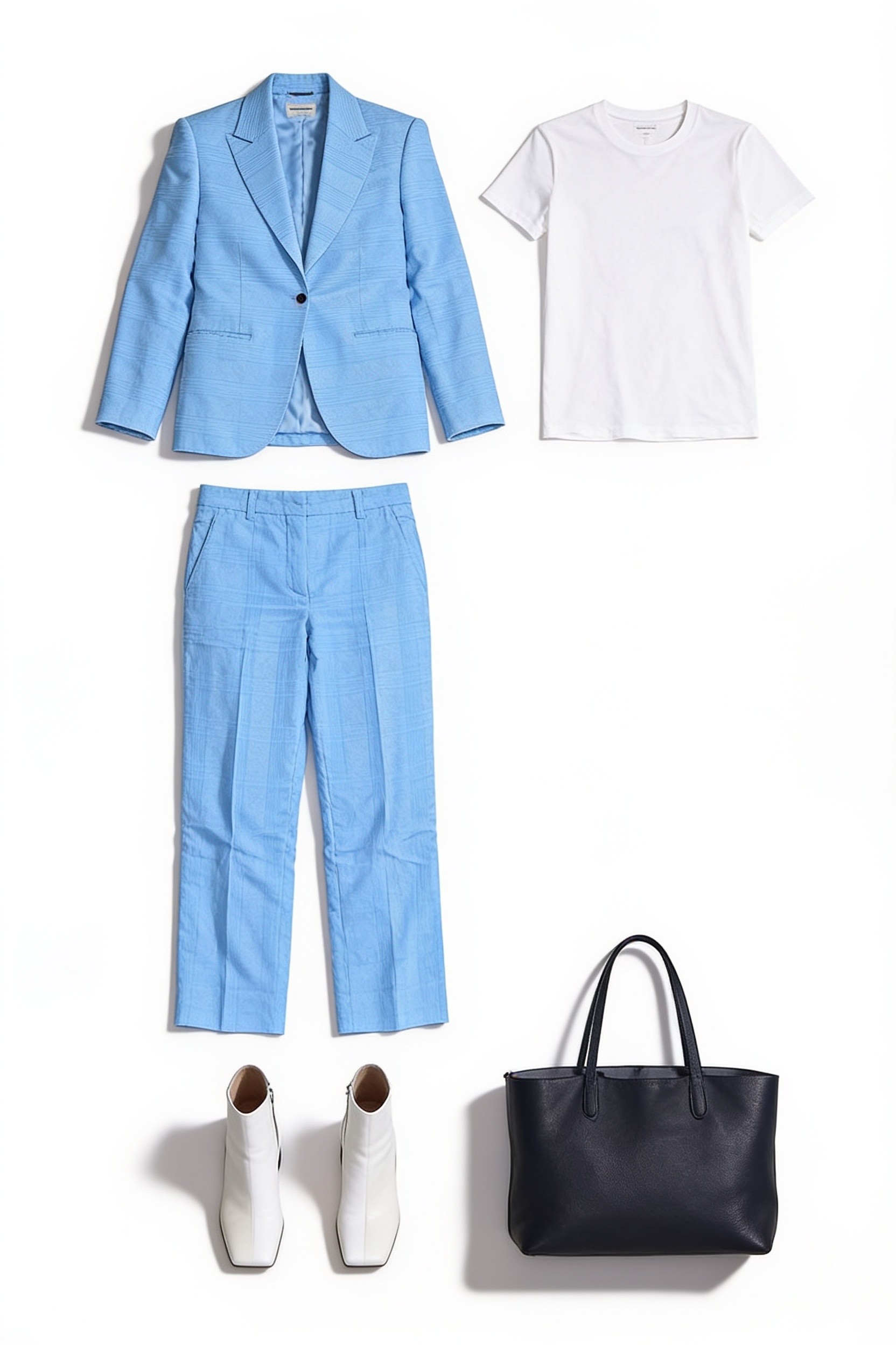 Sky blue trouser suit and white ankle boots